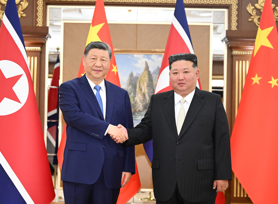习近平同金正恩举行会谈(图1)